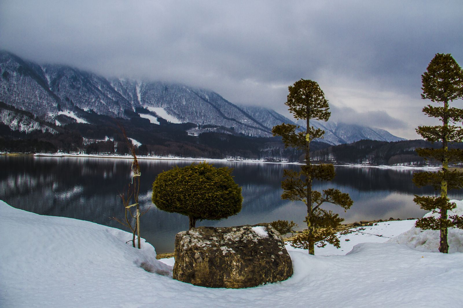 Hakuba winter lake with mountain reflection